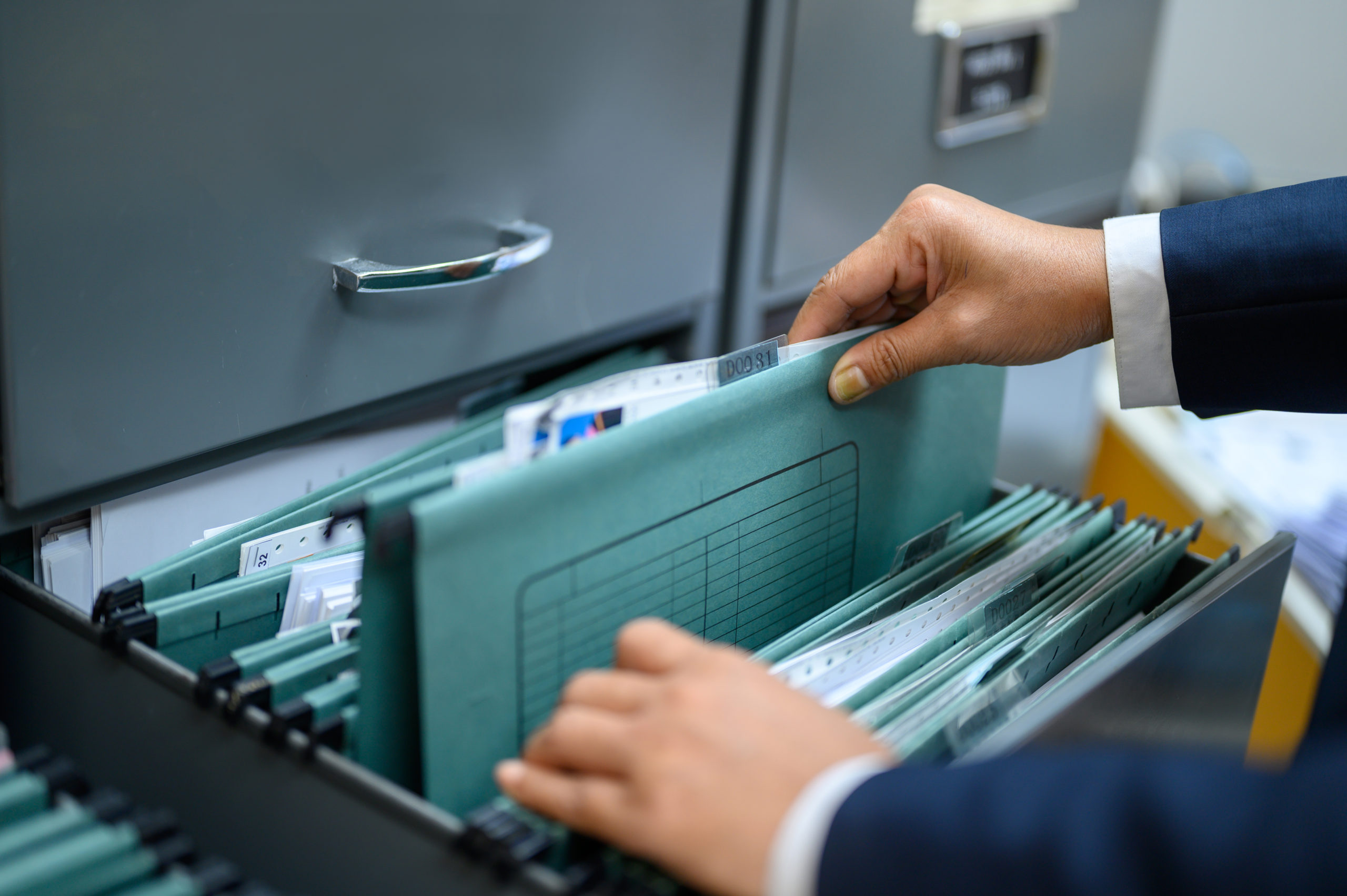 employees are managing documents office scaled
